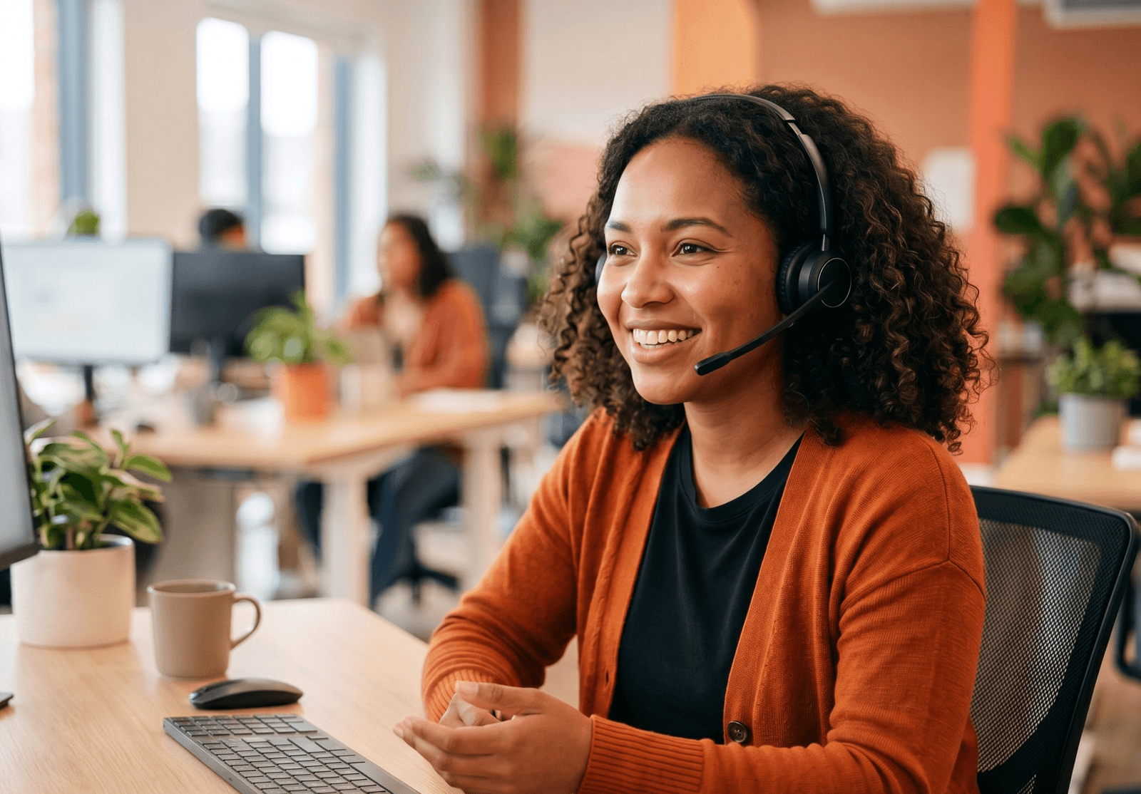 Concierge team member on a headset guiding an applicant through their application